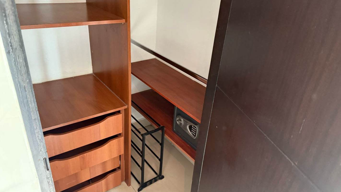 Modern master bedroom with ocean view large window in PH Punta Paitilla Panama