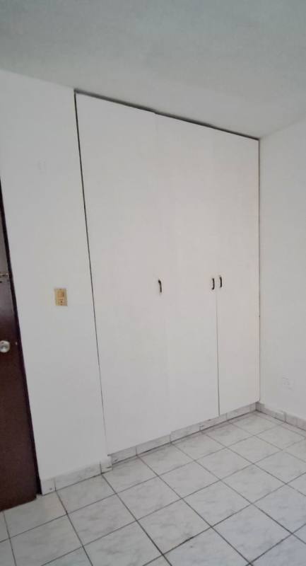 Bedroom interior with white floors for rent in PH Torres del Sol Panama City