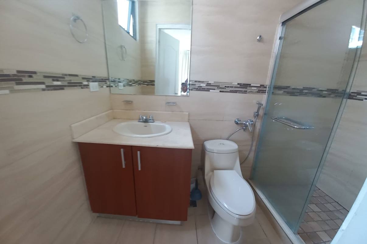 Bathroom with glass shower enclosure, vanity, and large mirror PH San Francisco Bay Panama City