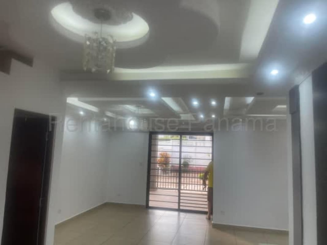 Large backyard with covered terrace, garden and privacy fence at PH Olympus II