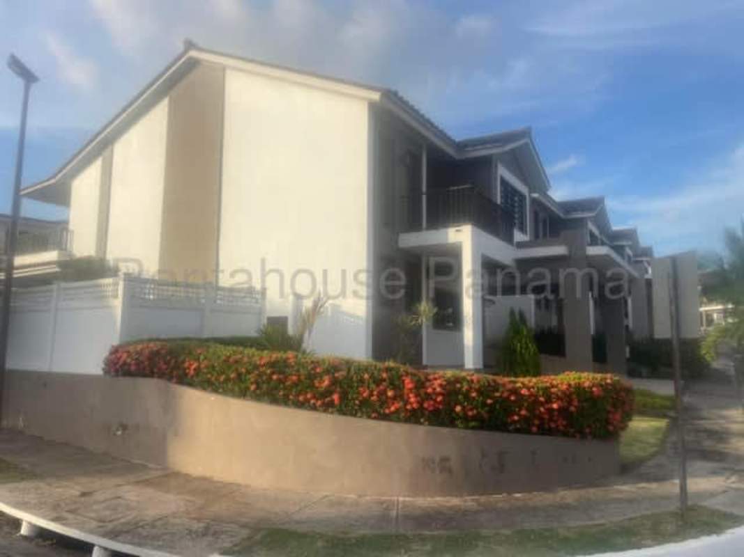 Contemporary kitchen with granite countertops, island, wood cabinetry in PH Olympus II