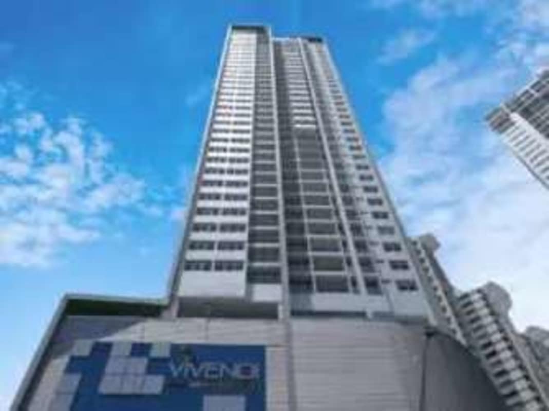 Contemporary high-rise condo with balconies and glass facade PH Vivendi Green Edison Park Panama