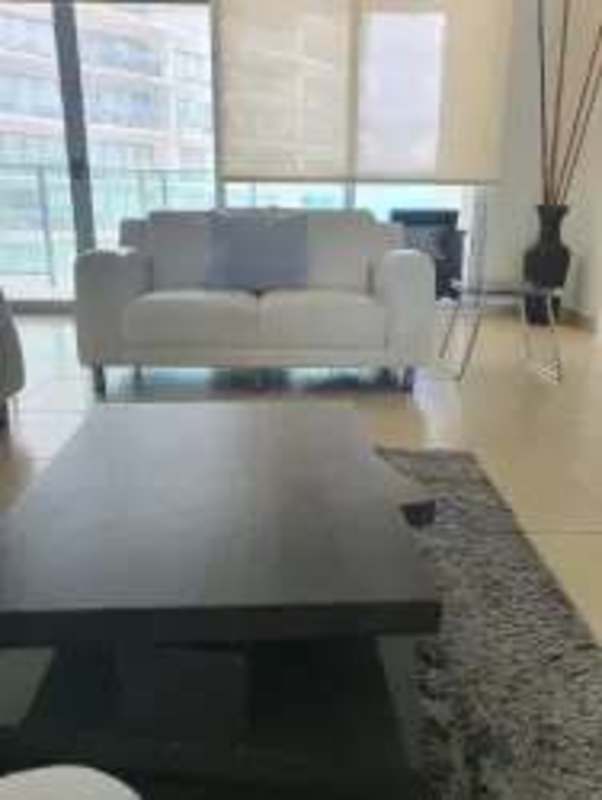 Open kitchen with granite counters and stainless appliances in Punta Pacifica luxury condo