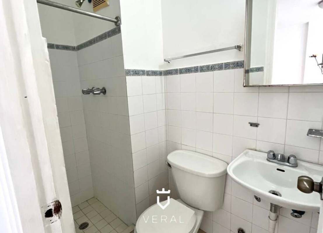 Kitchen with wooden cabinets, granite counters in PH Mar del Sur apartment for rent Panama