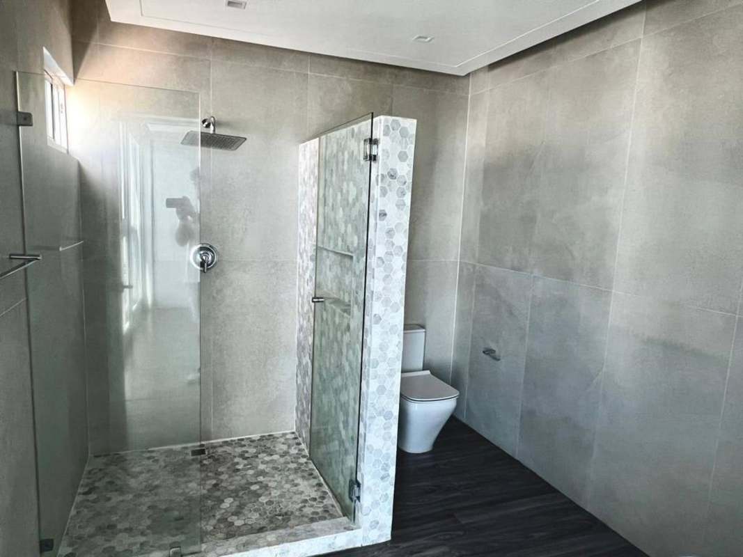 Bright living room with panoramic glass windows ocean skyline view San Francisco Panama