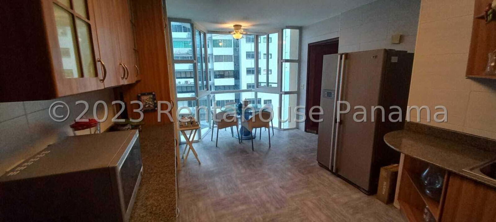 Spacious kitchen with granite countertops and dining space PH Miramar Punta Paitilla Panama