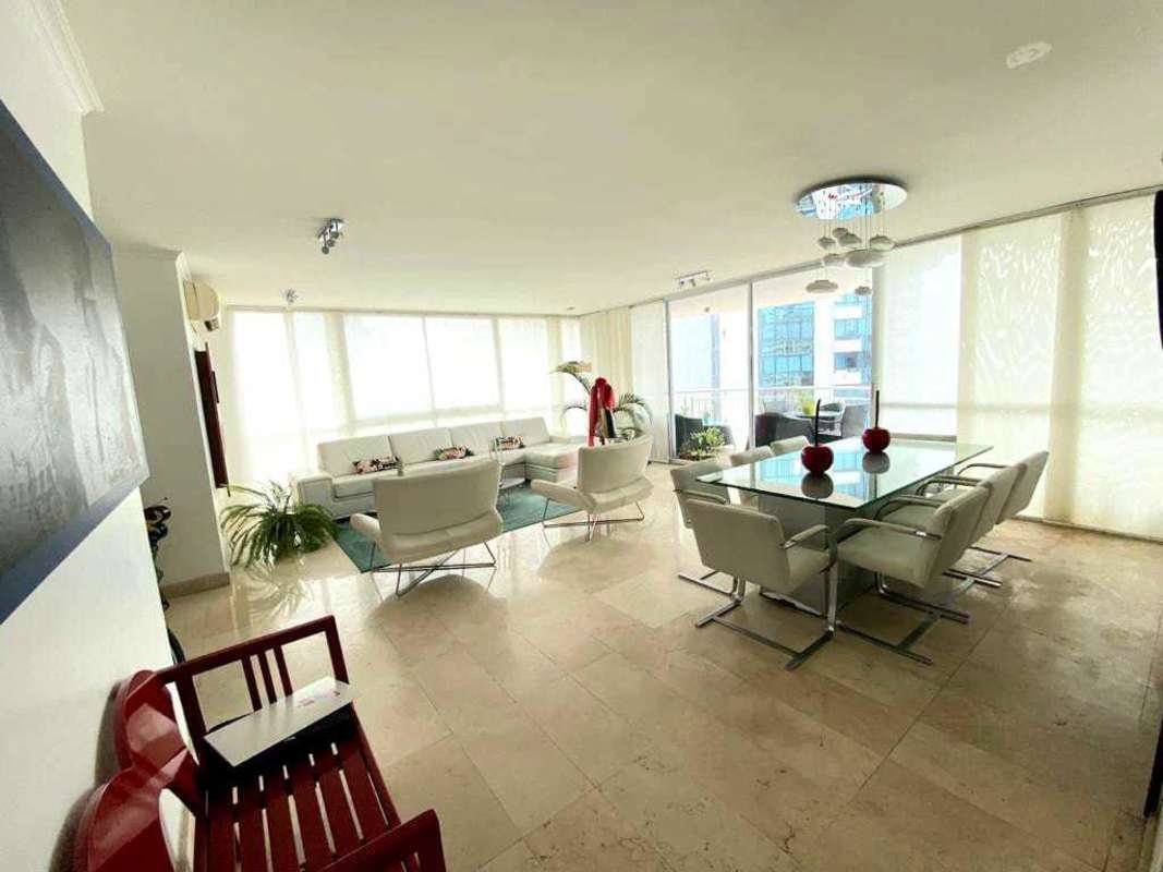 Large living space with floor-to-ceiling windows, city views and access to terrace Punta Paitilla Panama