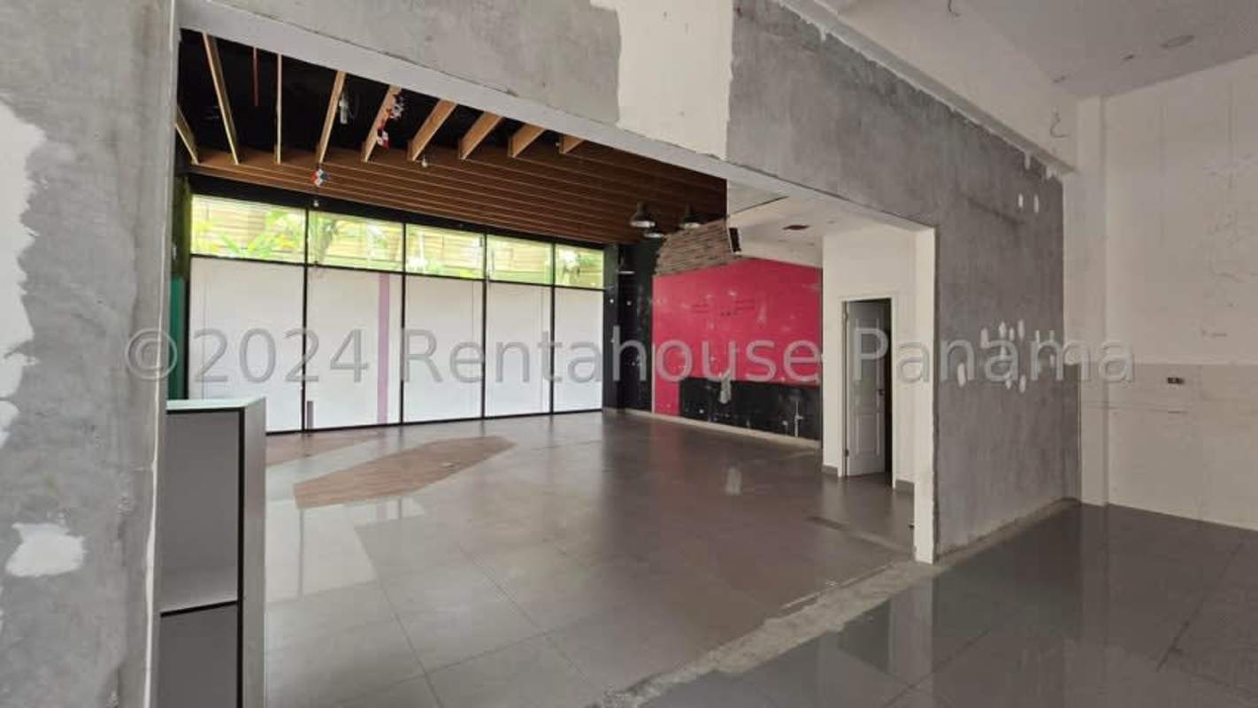 Spacious open plan commercial interior with ceramic floors and ceiling fixtures Panama