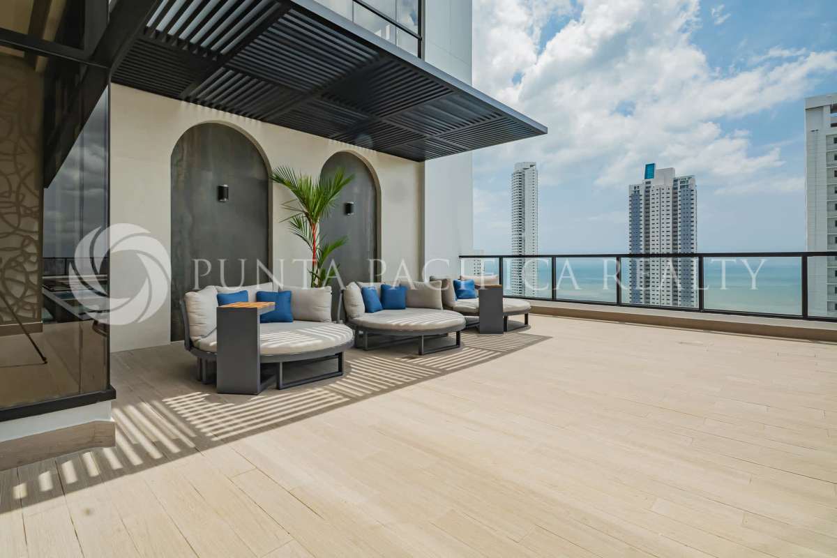 Modern bedroom with large windows city and ocean views in Costa del Este Panama