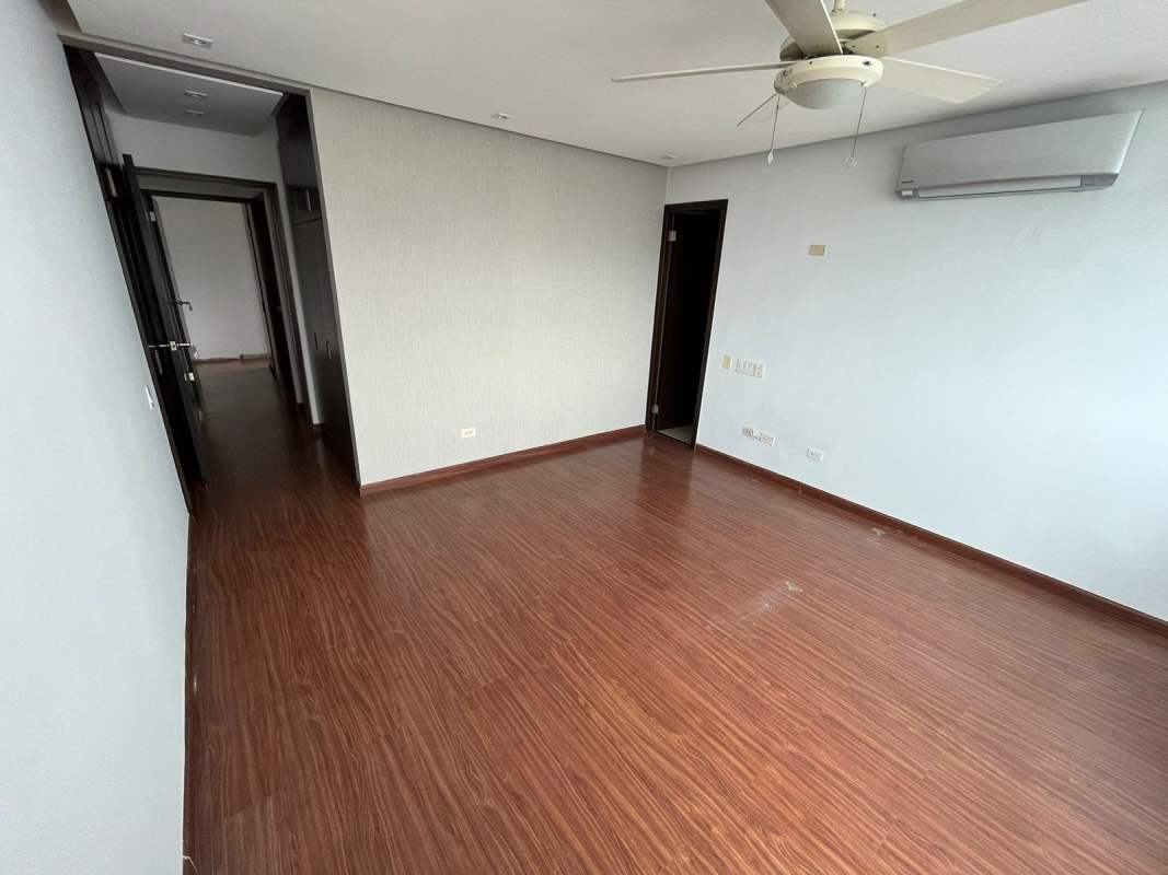 Secondary bedroom with city view window wood floors Infinity Tower Panama