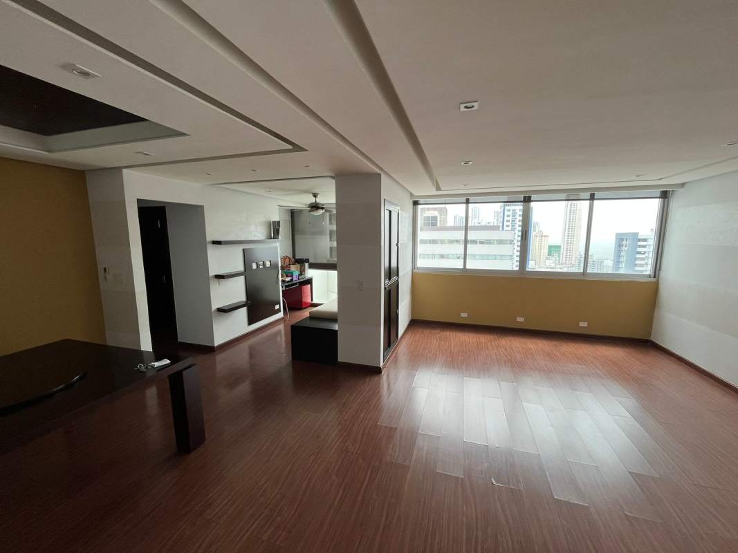 Spacious living dining area with balcony access and city view in Infinity Tower San Francisco