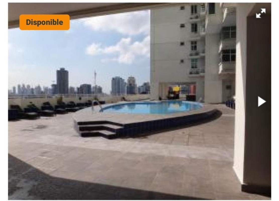 Modern rooftop pool with lounge chairs and panoramic city skyline views PH Torre Vivendi Edison Park
