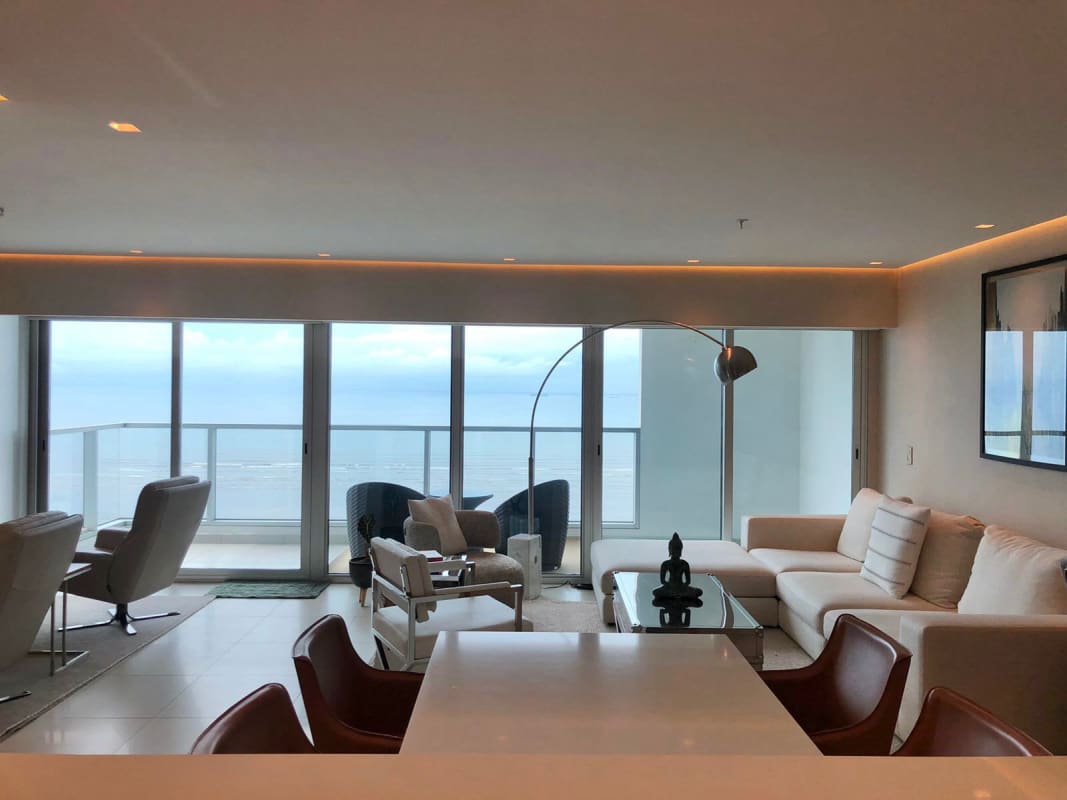 Fully equipped modern kitchen with quartz countertops and wood cabinets at PH Parkside Costa del Este Panama