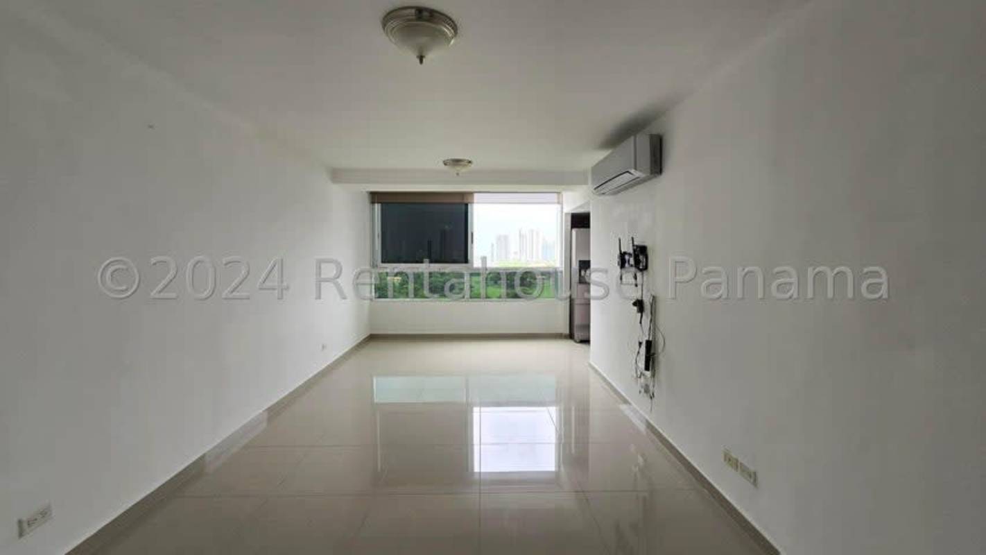 Kitchen with granite counters, cabinets and large window at PH Carrasquilla Park View Carrasquilla Panama