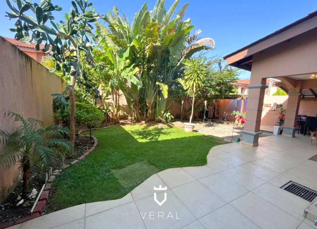 Modern dining area with glass table at furnished duplex home in Versalles Costa Sur Panama