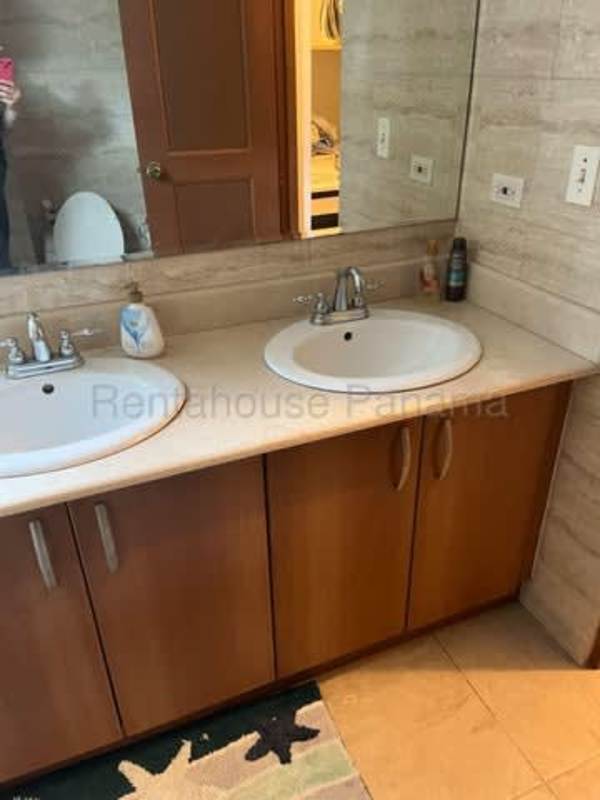 Bedroom with built-in closet, split AC, ceiling fan at PH Amador Hill Panama City