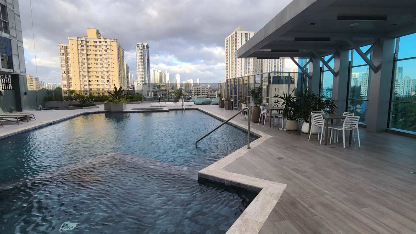 Modern lobby with elevators wood paneling marble floor PH Park Square Vista Hermosa Panama City