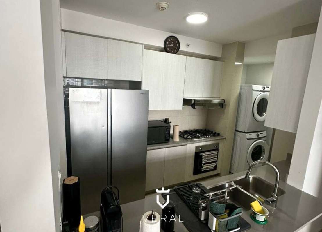 Bright living dining room with large windows and city view PH Costanera