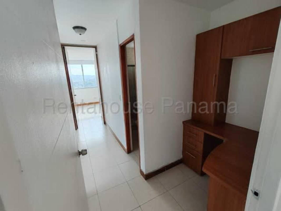 Modern kitchen with granite counters and wood cabinets in PH Mont Royale Panama City