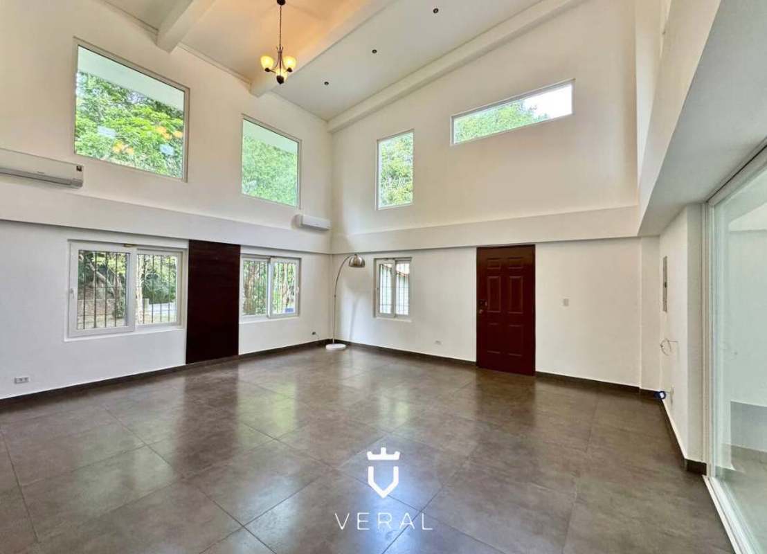 Front exterior view of two-story family home for rent at Cardenas Village Clayton Panama City