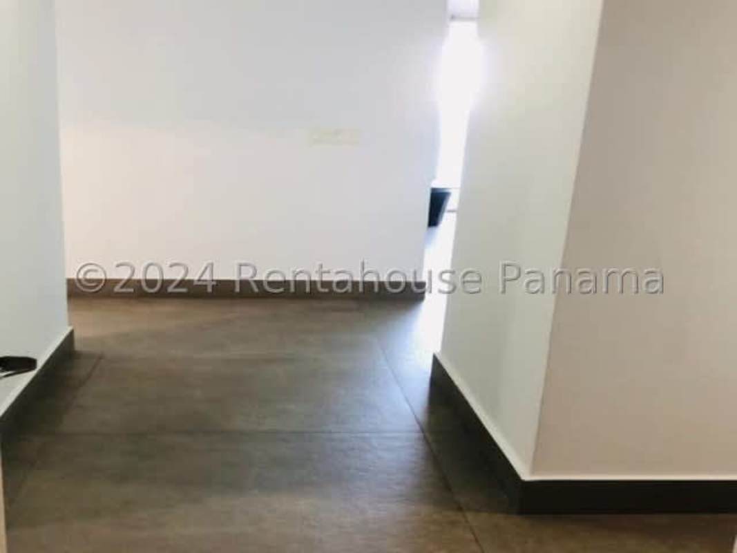 Living dining area with large windows, sliding doors to balcony, sea view in PH Nautica Coco del Mar Panama