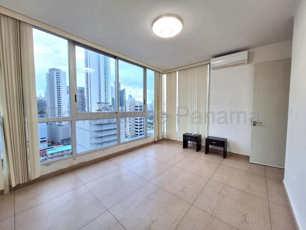 Modern bathroom with glass shower enclosure in PH Vista Balboa Panama City