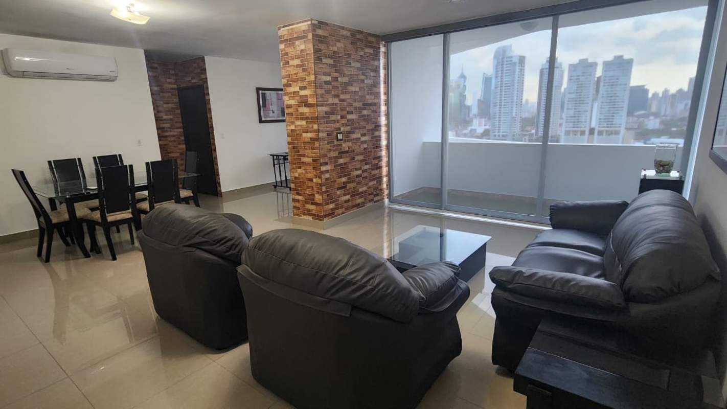 Dining room with large windows offering skyline views in PH San Francisco Bay Panama City