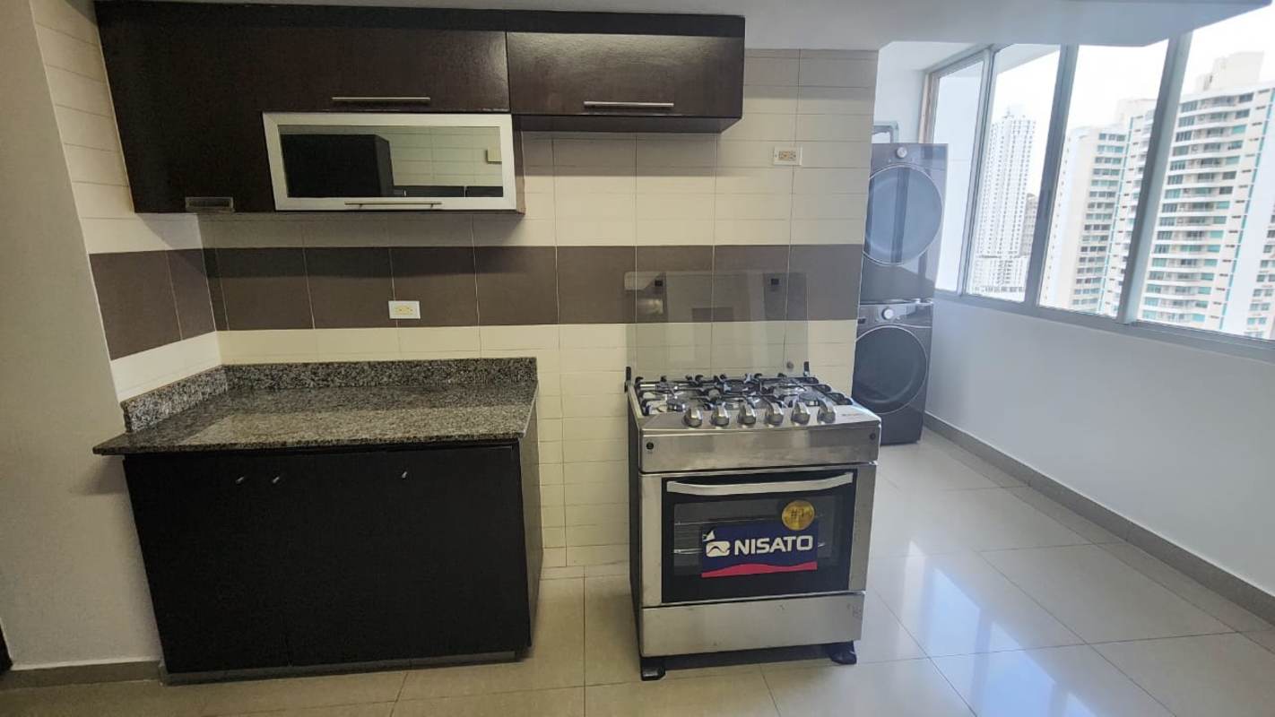 Contemporary kitchen with granite countertops and stainless steel appliances in PH San Francisco Bay Panama City