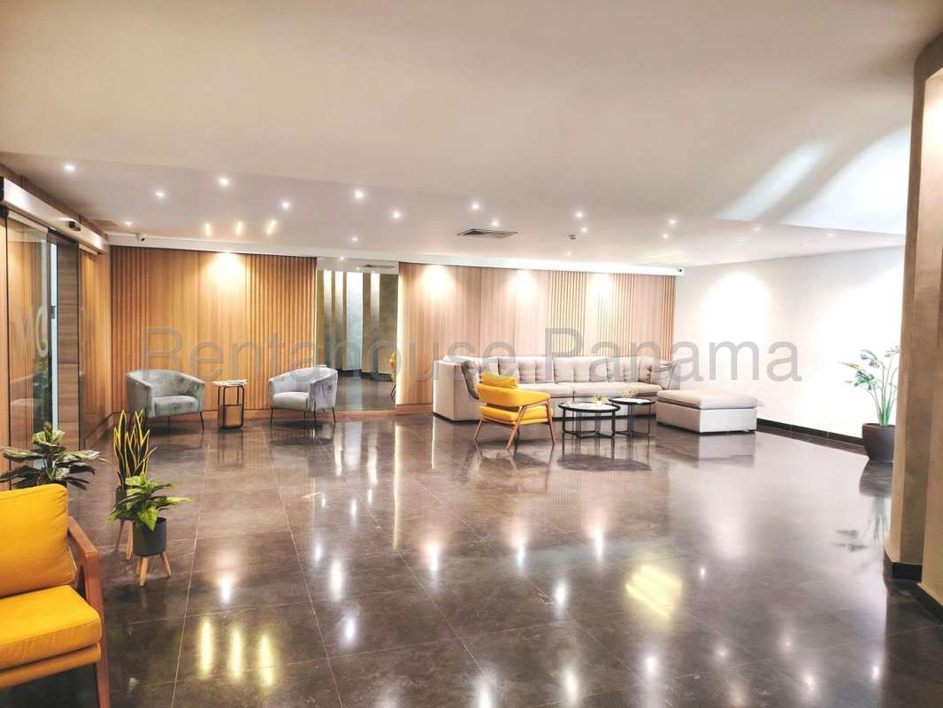 Modern lobby with wood accents and designer furniture PH Moon Tower Panama City