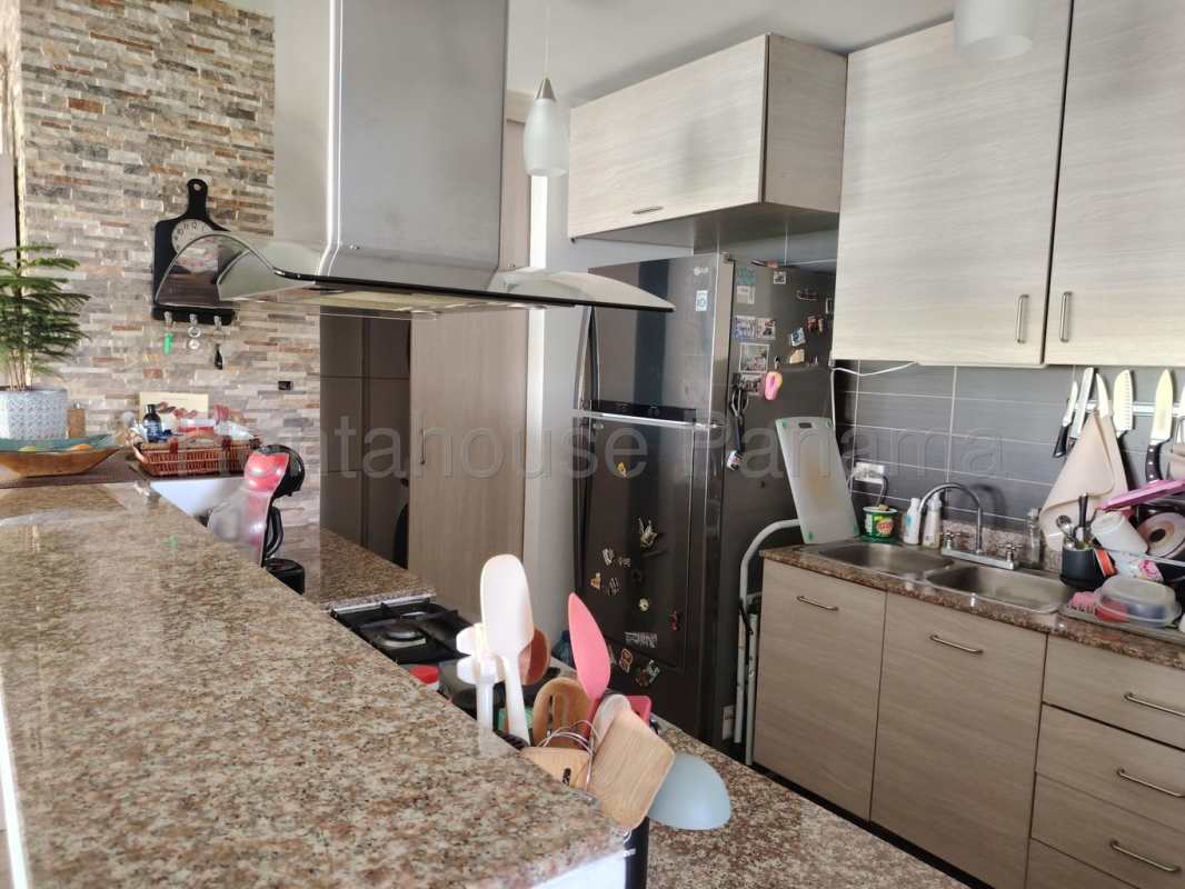 Kitchen with granite counters, stainless appliances, ample cabinetry PH Moon Tower San Francisco Panama