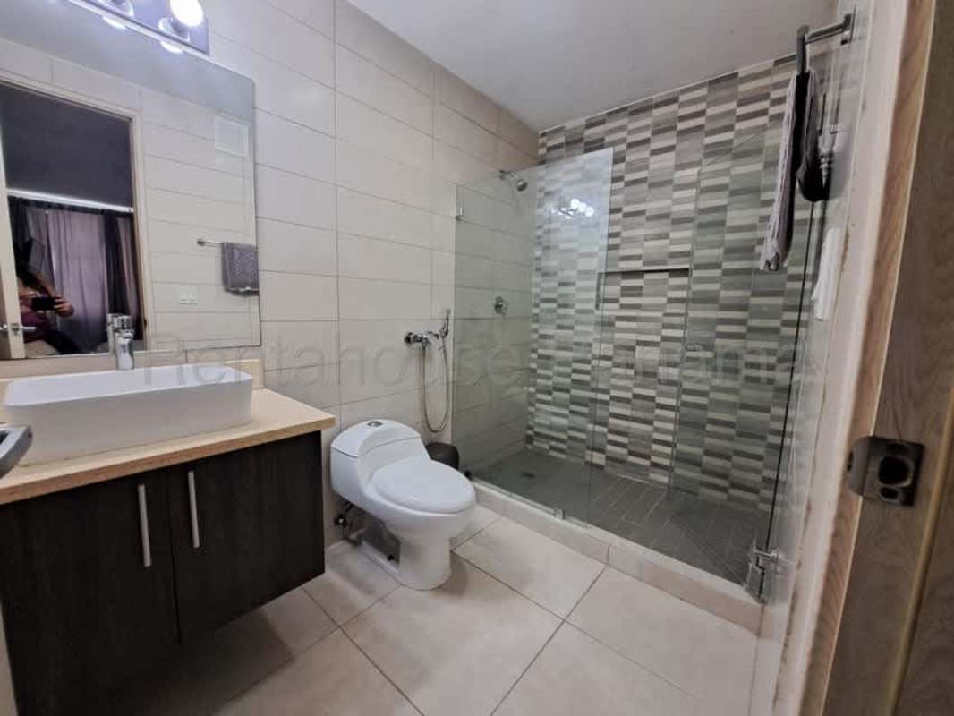 Modern kitchen granite counters, white cabinets in PH Pacific Park Tumba Muerto Panama