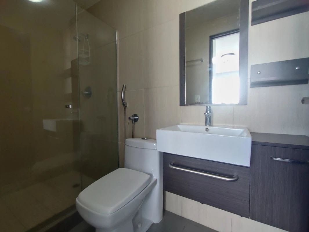 Modern bathroom with glass shower and vanity PH Bella Vista Tower Panama City