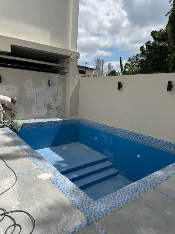 Outdoor swimming pool at PH Teus Tower I with deck Panama City