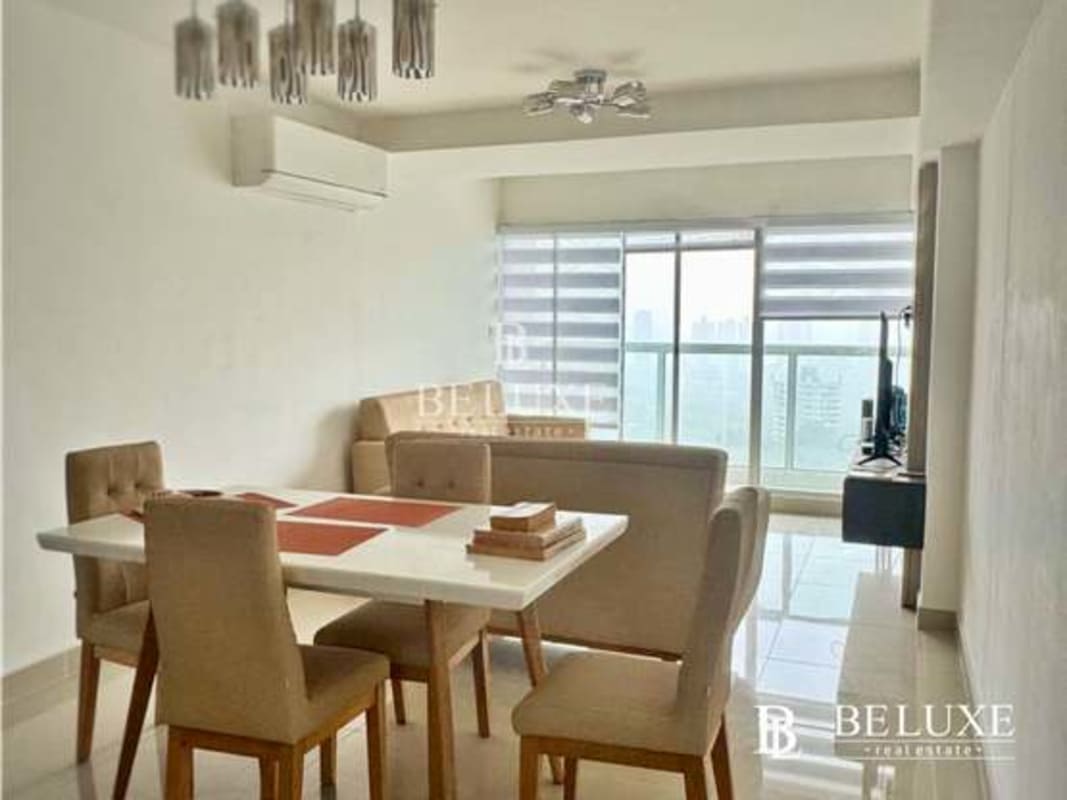 Open dining area with modern furniture in PH Residencias del Sol Carrasquilla