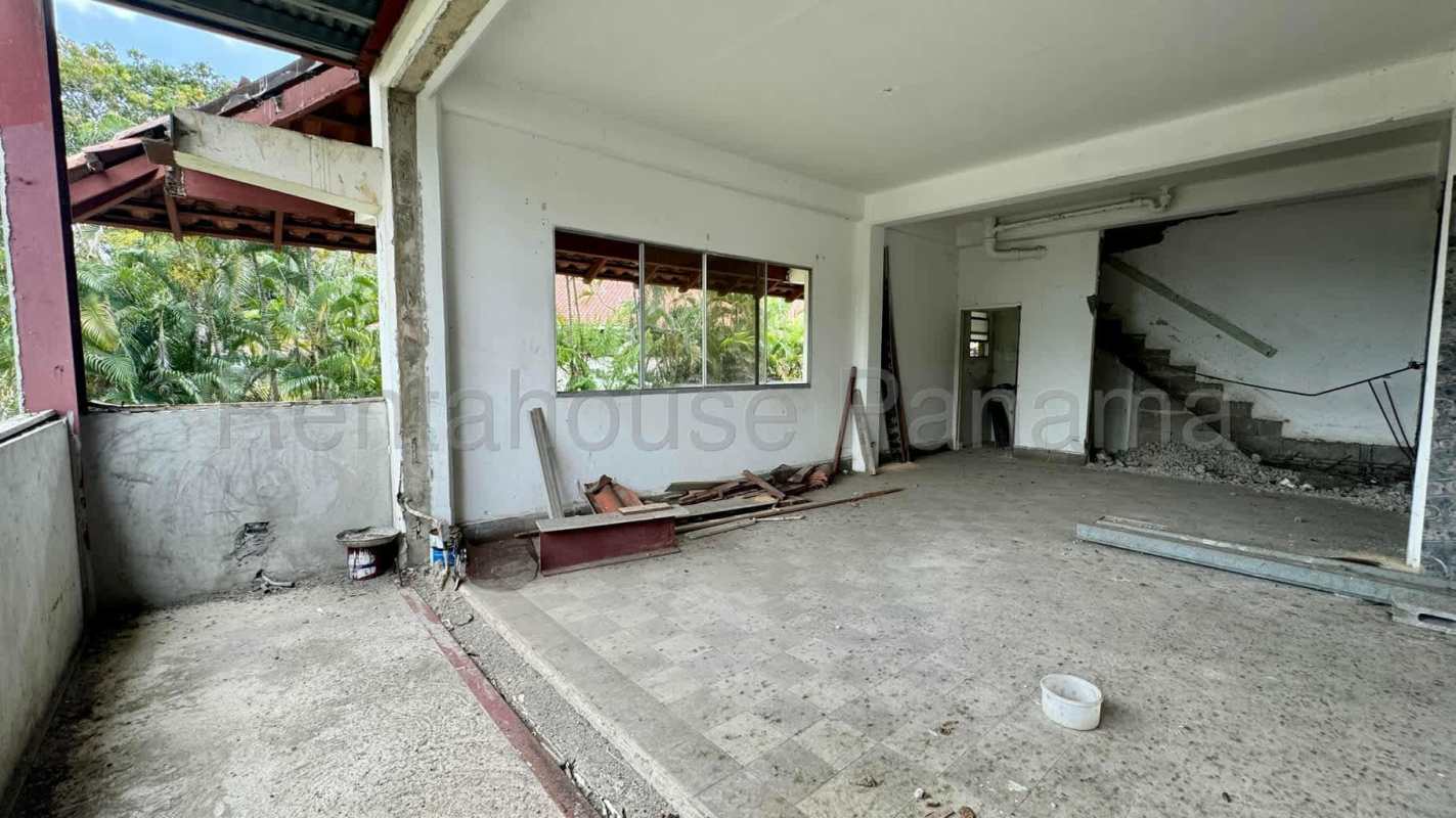 Spacious unfinished bedroom with window and balcony access for sale Albrook Clayton Panama