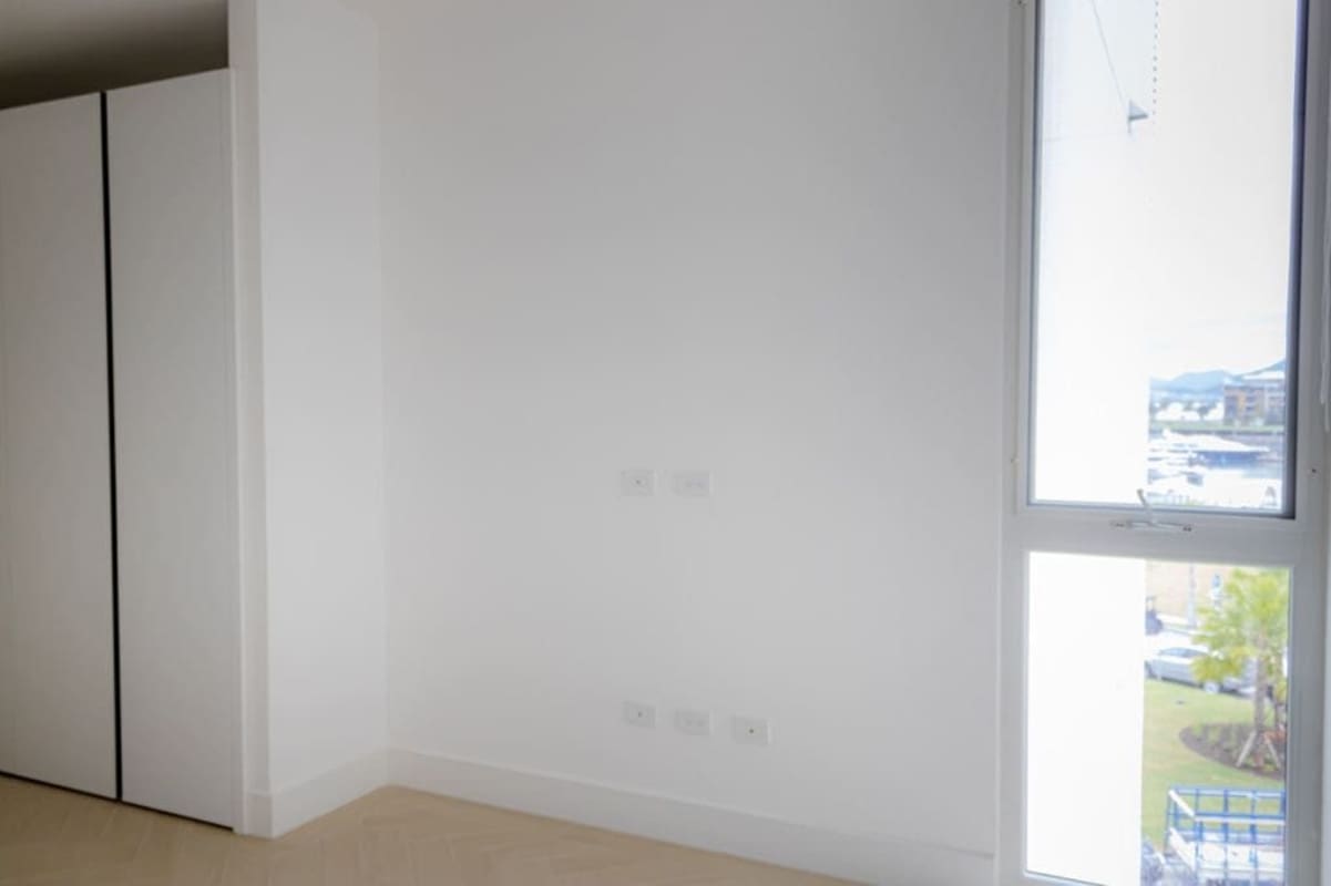 Minimalist ocean view bedroom floor to ceiling windows PH Waterfront 40 Ocean Reef Panama