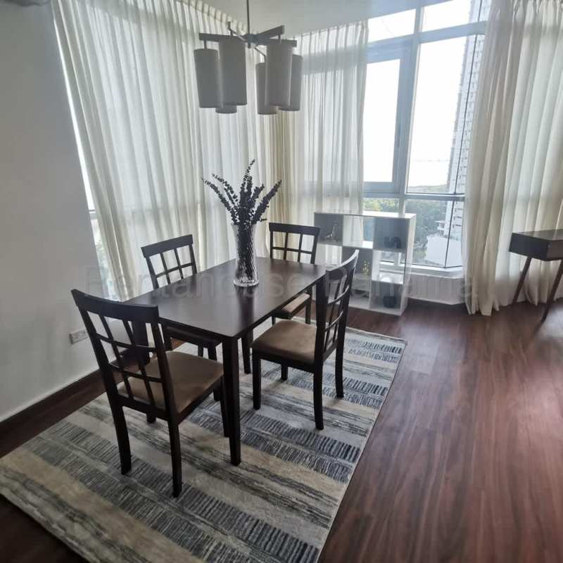 Modern bedroom with large windows city skyline view PH Riverside Costa del Este Panama