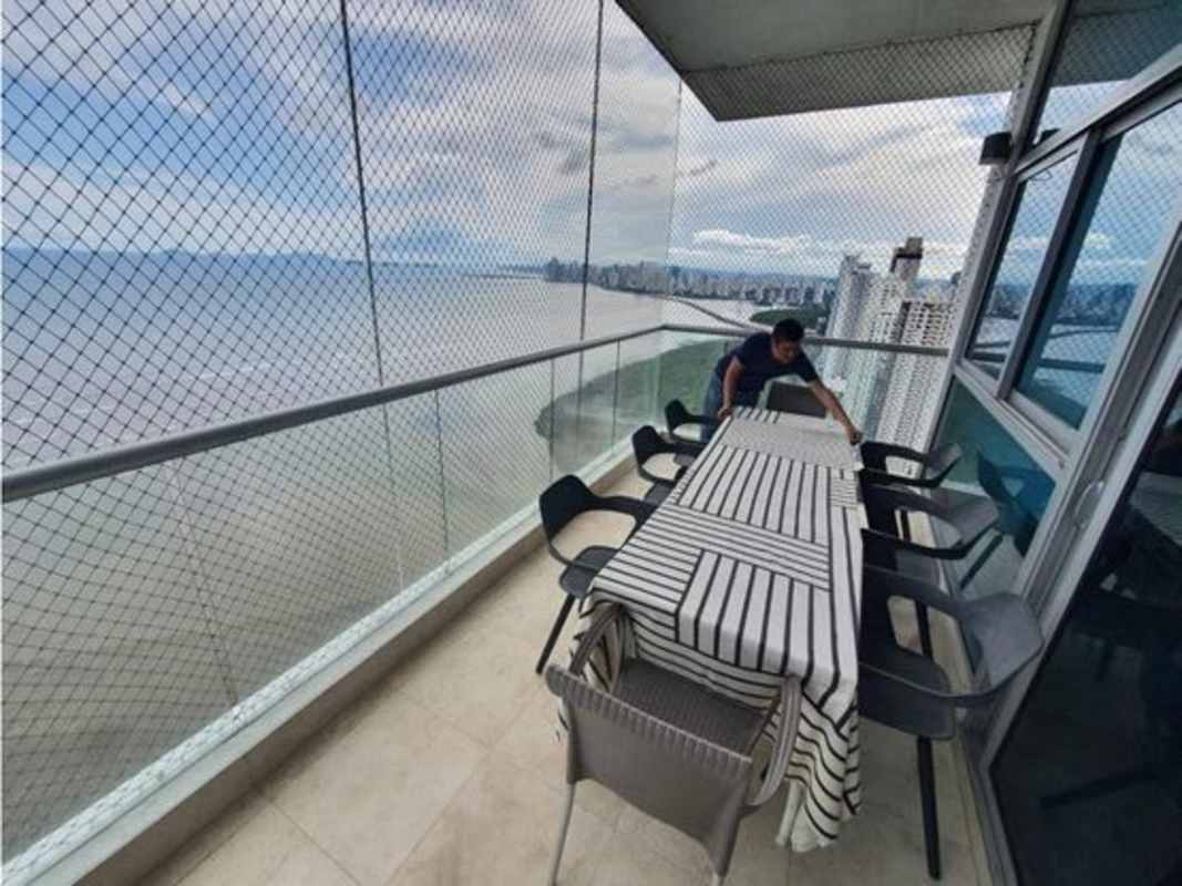 Outdoor dining terrace on high floor with ocean views PH Ten Tower Costa del Este Panama