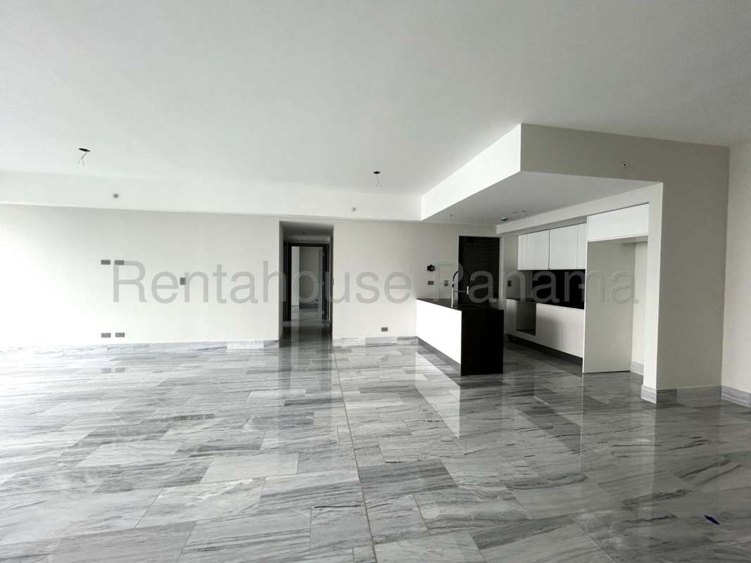 Spacious modern open living room with marble floors kitchen island floor-to-ceiling windows in Nuovo by Armani Panama