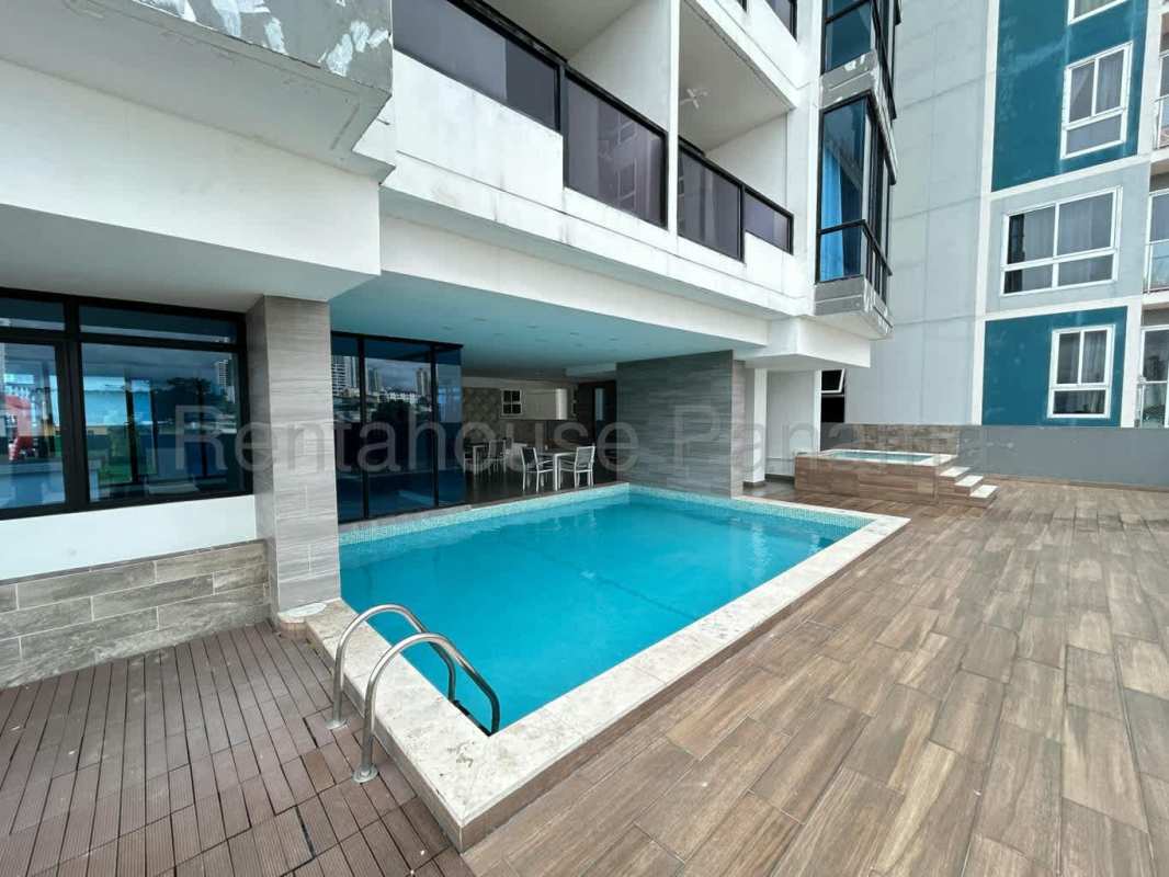 Rooftop kids playground with slides artificial grass PH Parque Lefevre Panama