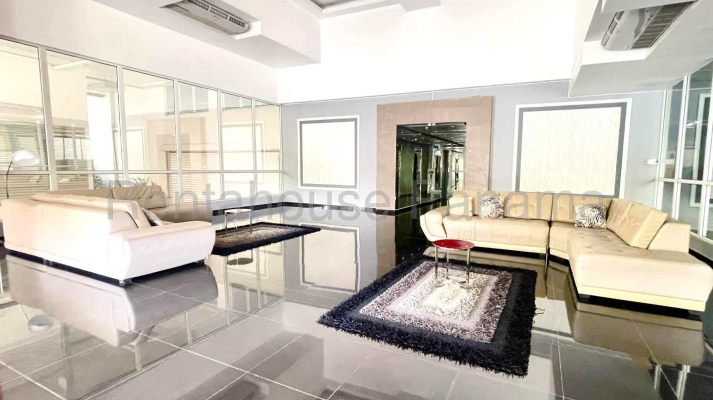 Modern spacious living room with sliding doors to terrace jacuzzi PH Bellagio Tower San Francisco Panama