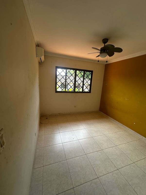 Spacious covered patio with garden view in Albrook home perfect for outdoor dining