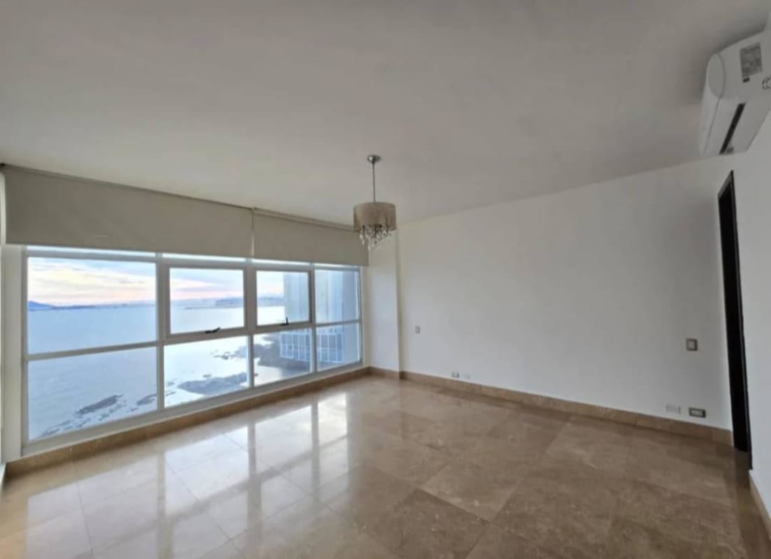 Spacious kitchen with granite countertops, stainless steel appliances in PH Q Tower apartment Panama