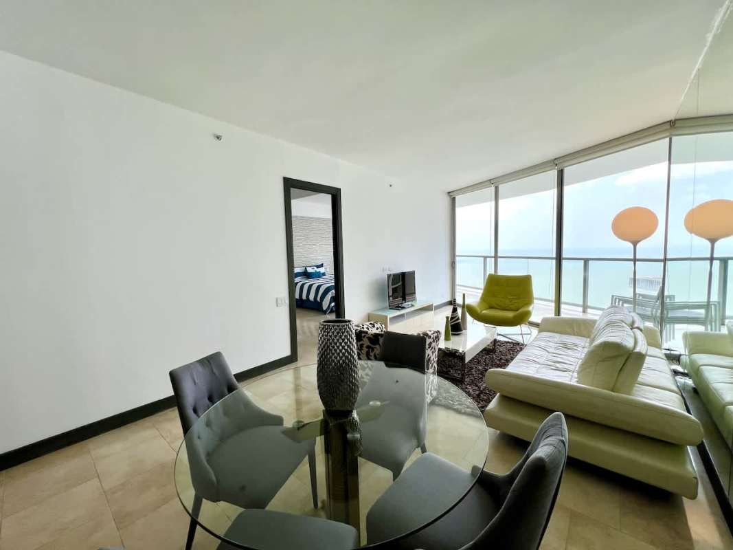 Bedroom with floor-to-ceiling windows and Pacific view at JW Marriott Panama