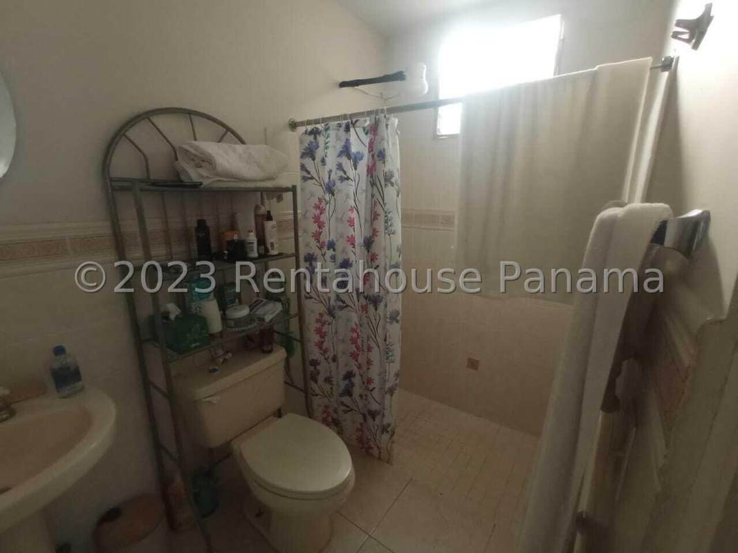 Bedroom with air conditioning ceiling fan ceramic tile Brisas del Golf Panama house sale