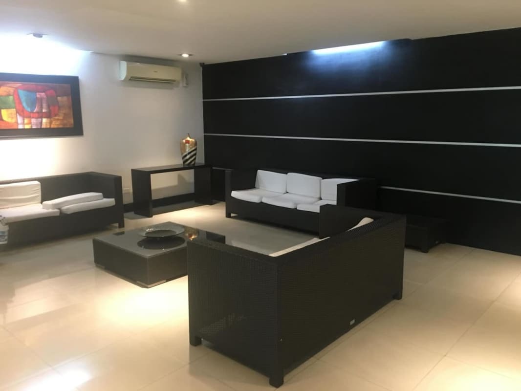 Bright living room with sectional sofa and accent colors PH Greenbay Costa del Este