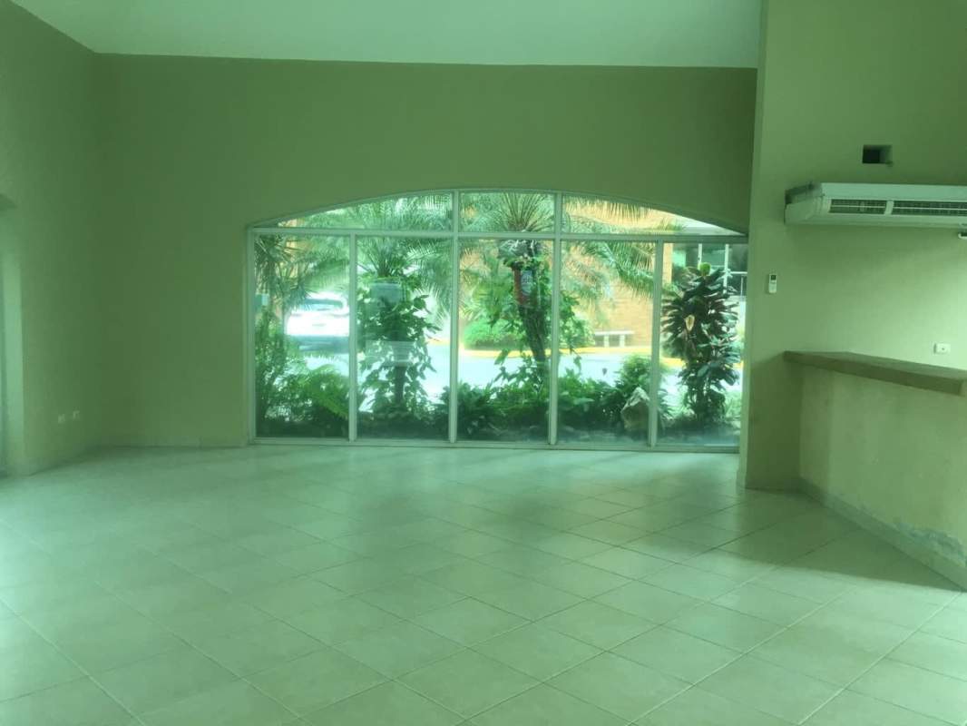 Multiple high-rise apartment towers gated entrance PH Greenbay Panama