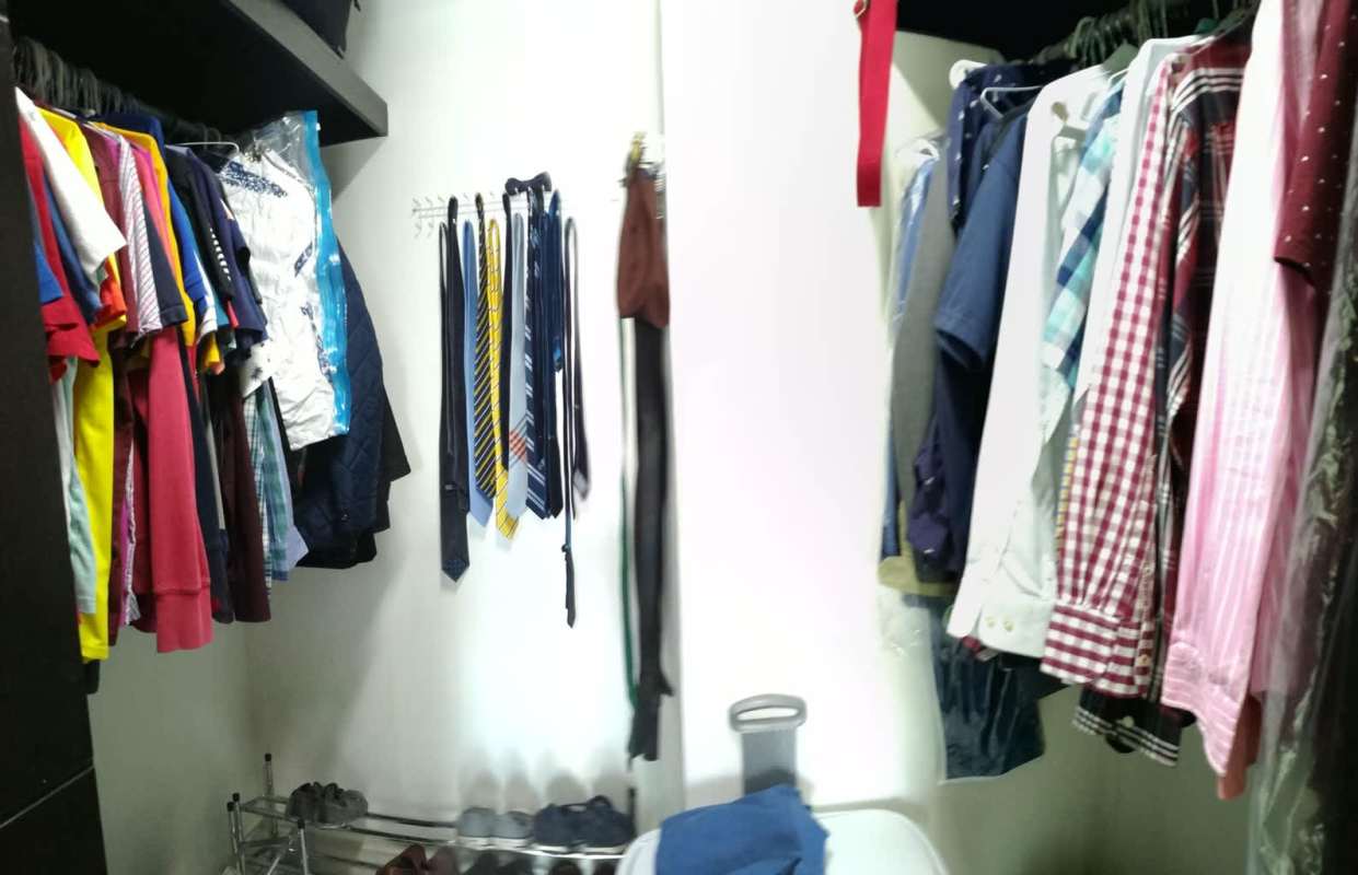 Bright living room with large arched windows garden view PH Greenbay Panama