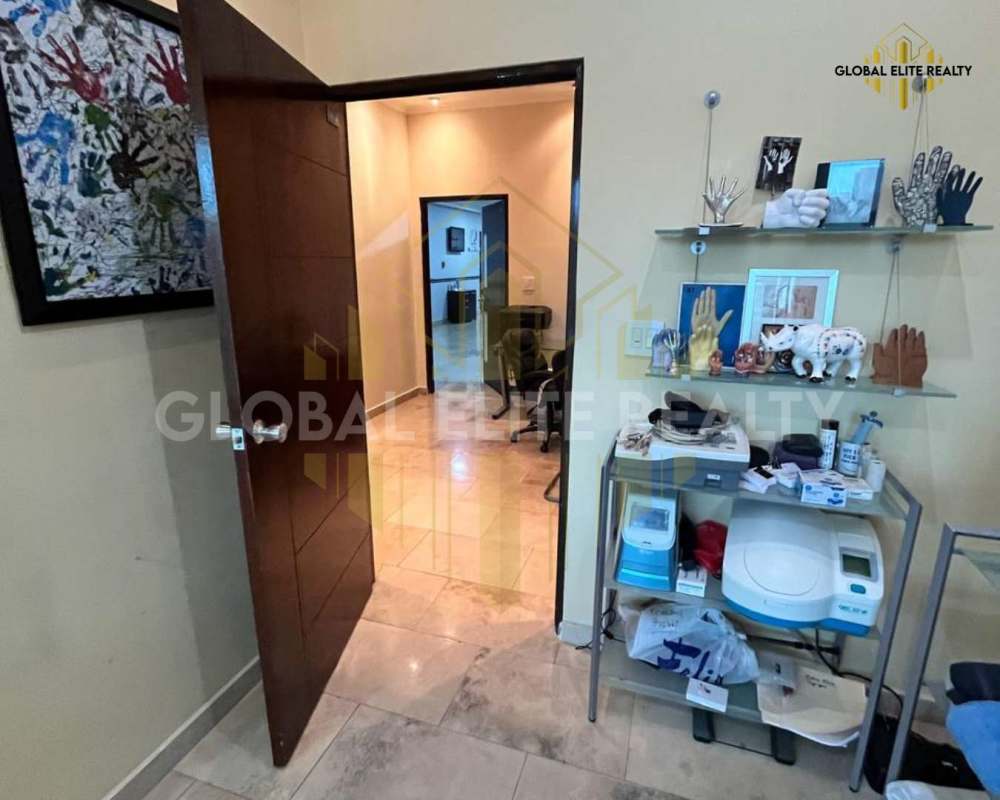 Interior view marble floor granite counter medical office Pacifica Salud Panama