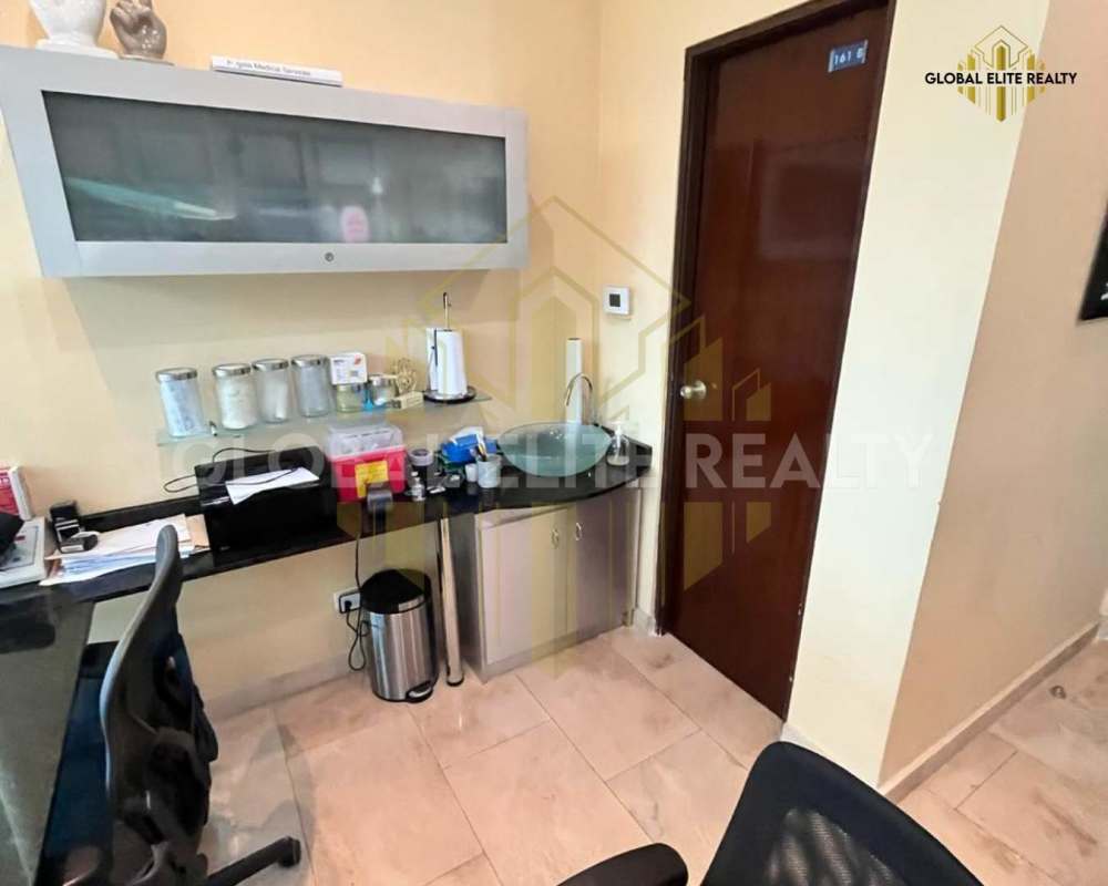 Reception counter with granite Italian marble consultation office at Pacifica Salud Punta Pacifica